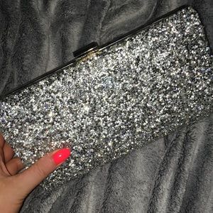 Silver sparkly clutch